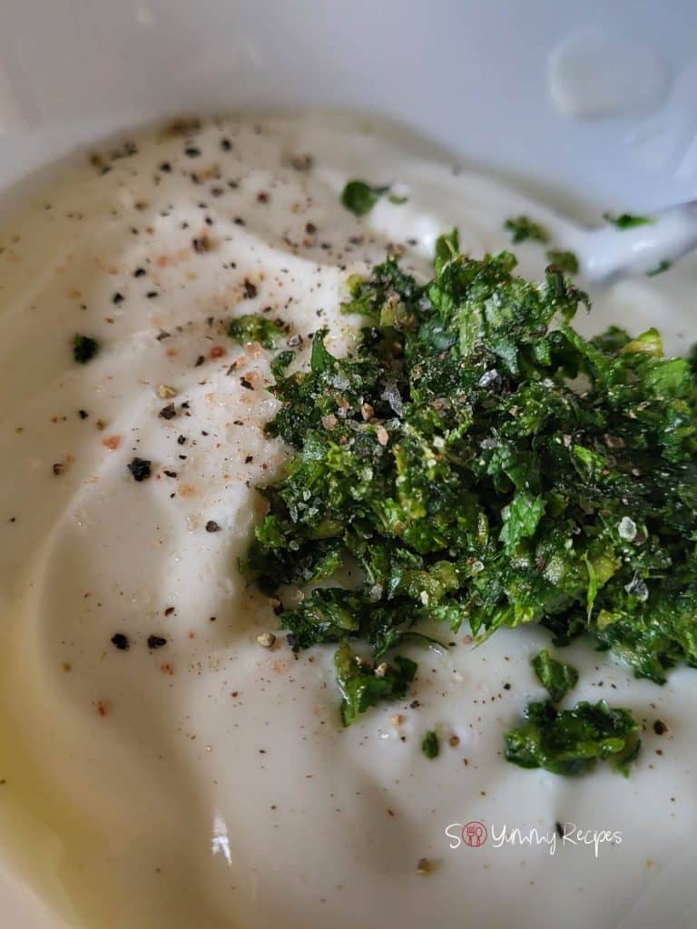 Yogurt, chopped herbs, crushed black pepper, and salt. 