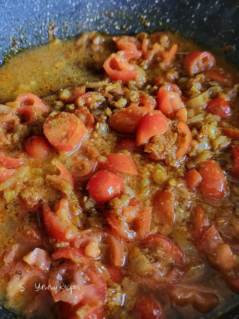 masala spices with chopped tomatoes.