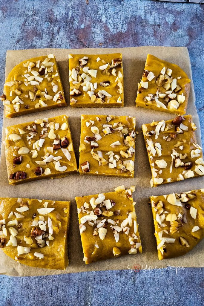 Pumpkin fudge with sweetened condensed milk cut into squares.