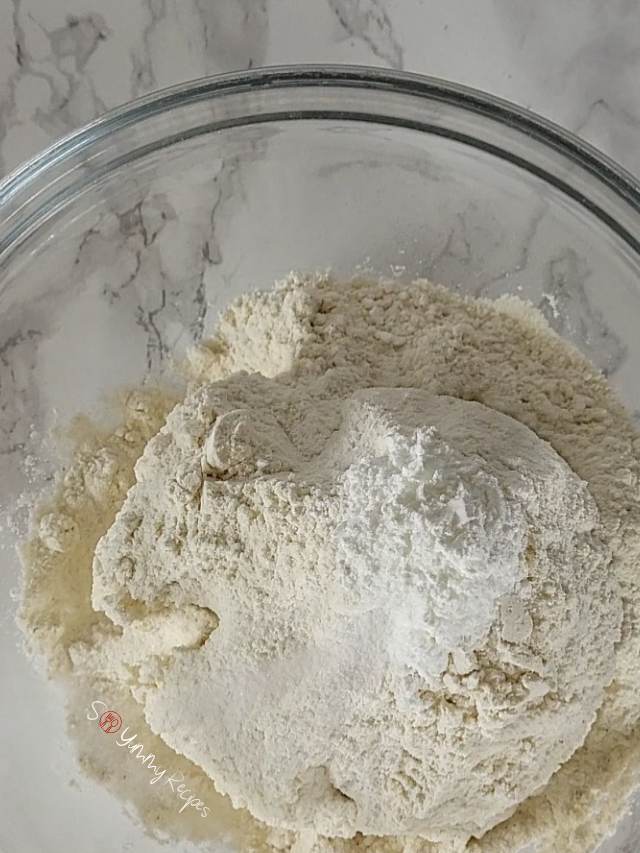 Almond flour, all-purpose flour, baking powder, and salt.