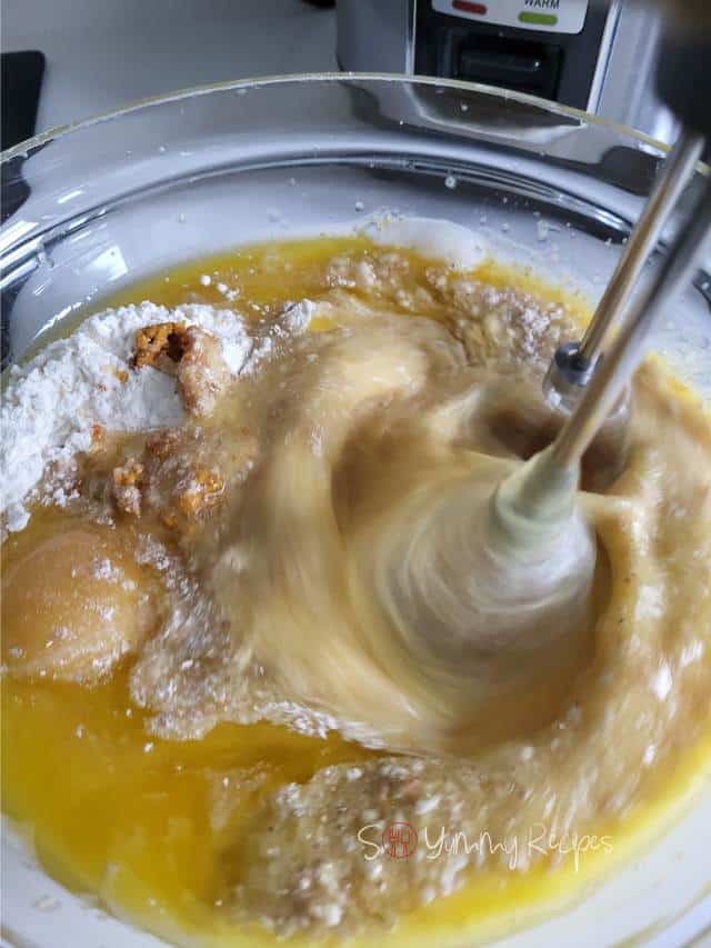 Mixing muffins ingredients.