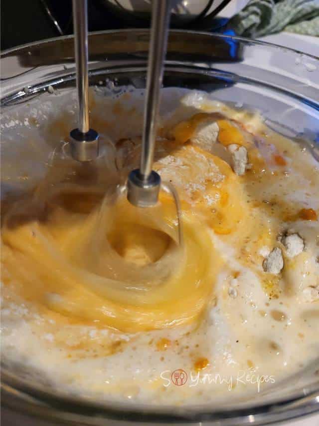 mixing muffin ingredients.