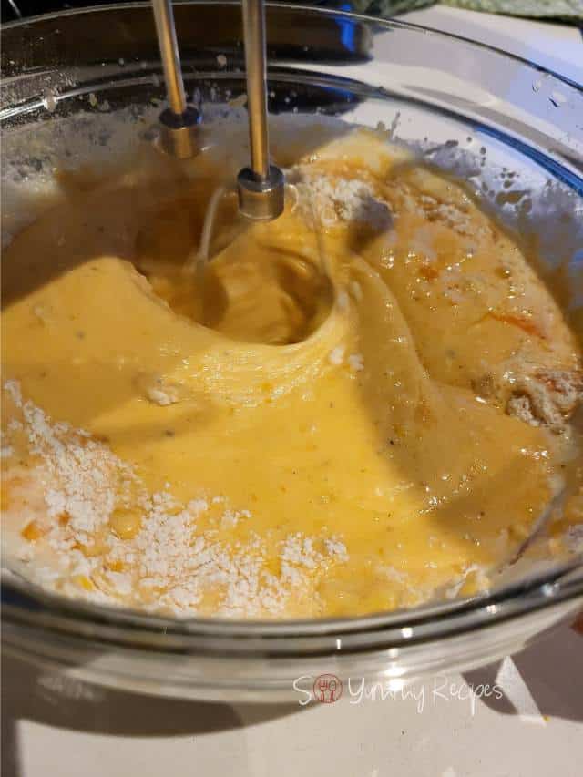 Mixing the muffin batter.