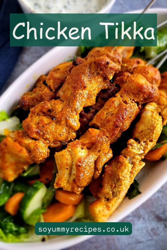 Chicken tikka with an overlay text.