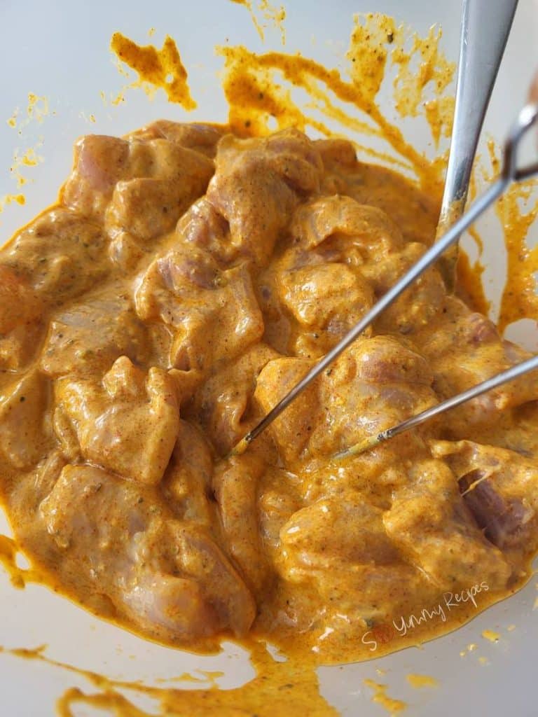 chicken pieces in marinade.