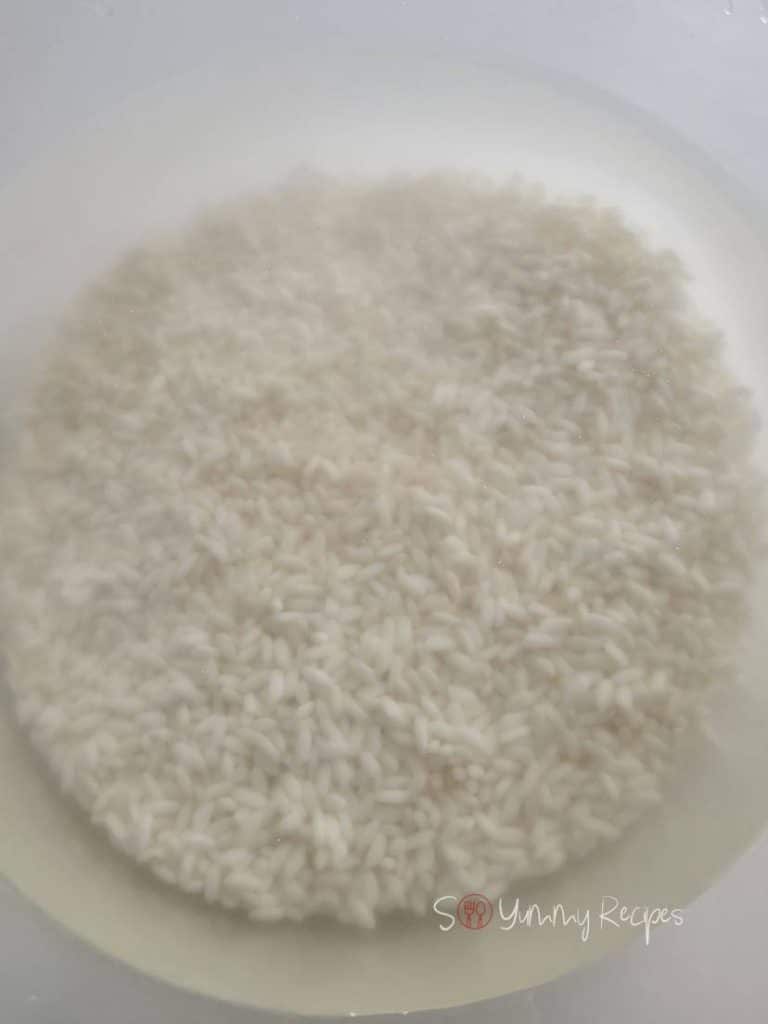 Rice soaked in water.