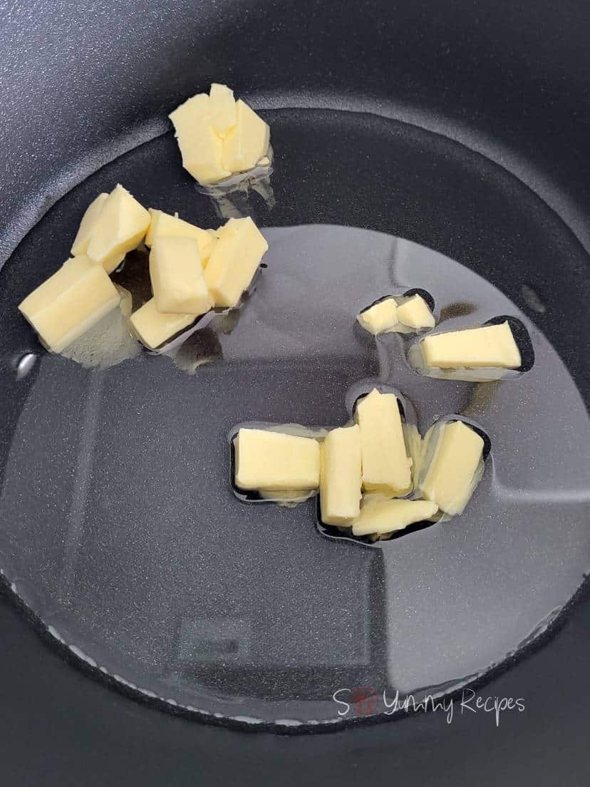 Oil and butter in a cooking pan.