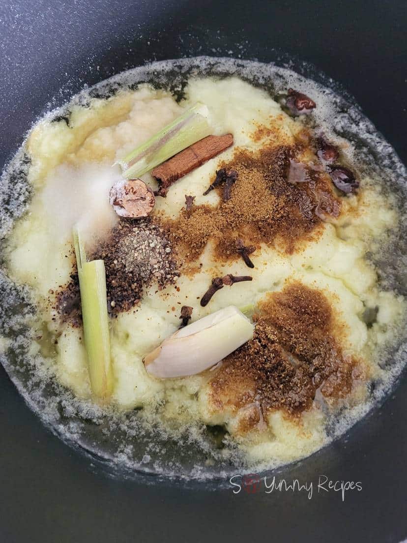 Spices and herbs in oil.