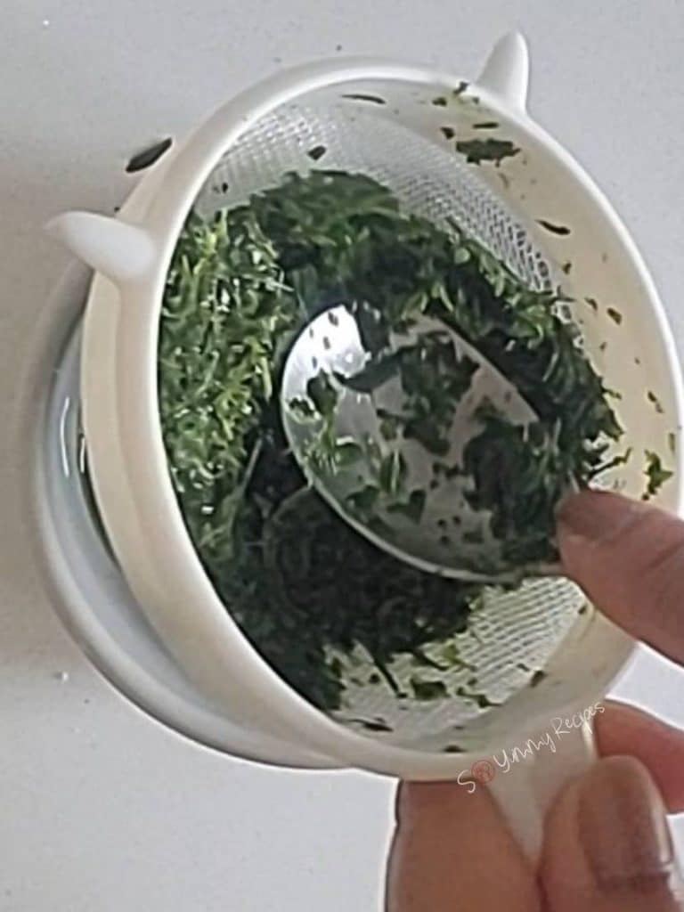 a sieve and teaspoon.
