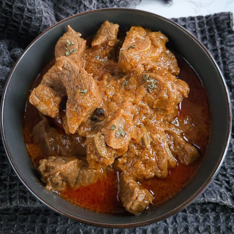A bowl of Kashmiri rogan josh curry.
