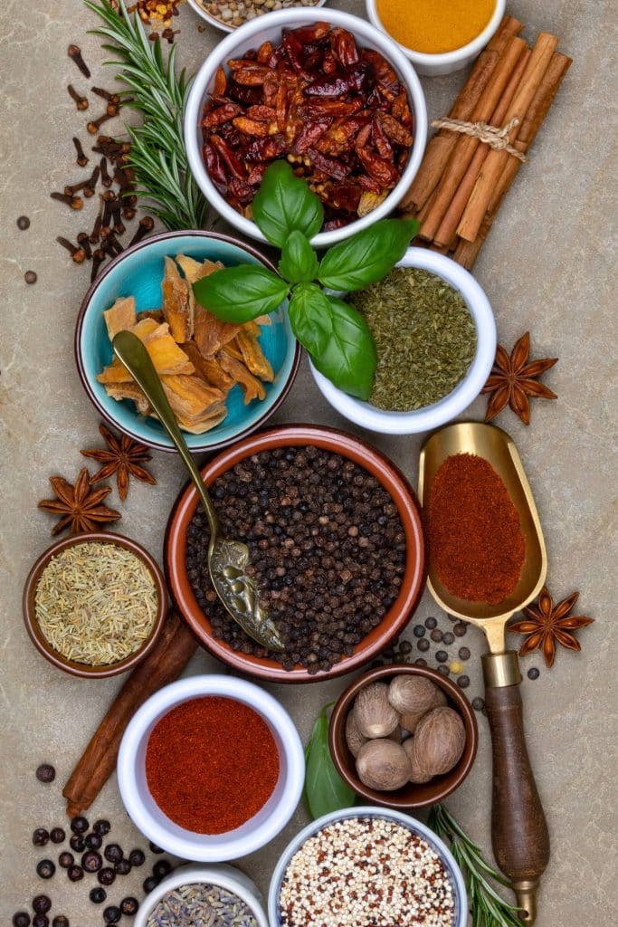 bowls of spices and herbs.