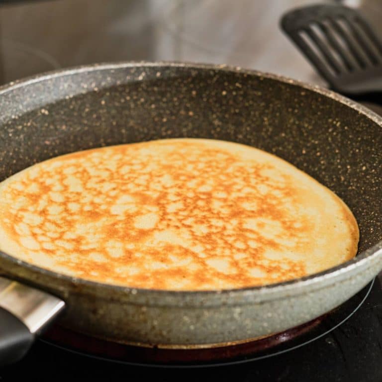 pancake on a frying pan.