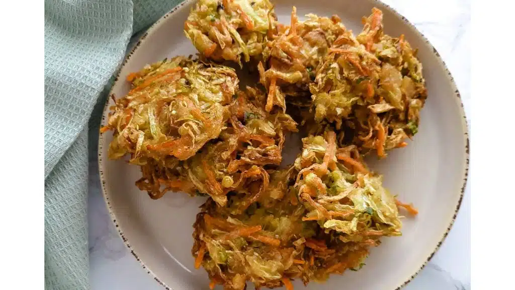 Bakwan Sayur on a brown plate.