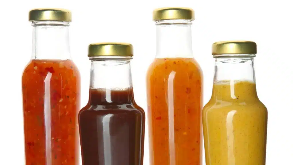 Bottles of condiment.