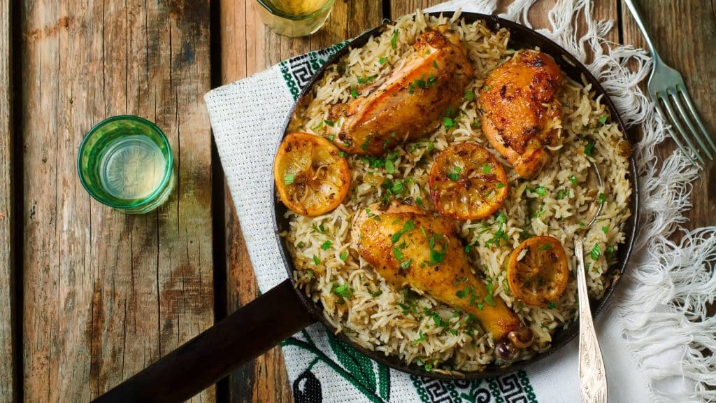A skillet of rice and chicken.