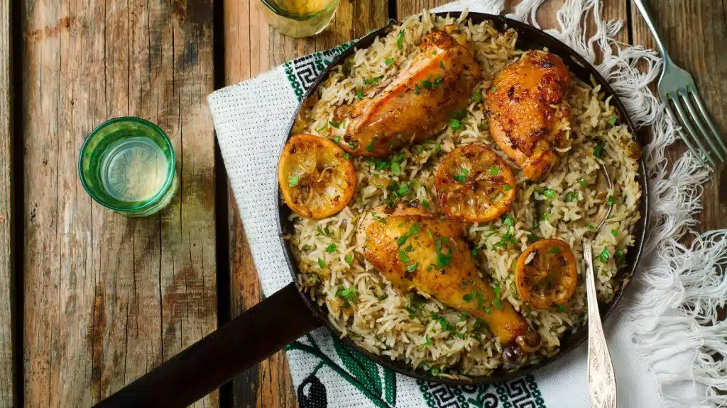 A skillet of rice and chicken.