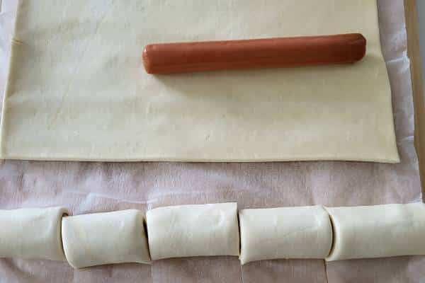 Frankfurter sausage on a puff pastry.
