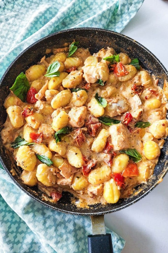 Spiced creamy gnocchi with salmon, sundried tomatoes and fresh basil.